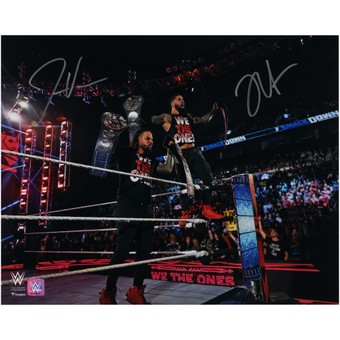 Jey Uso & Jimmy Uso WWE Autographed 16" x 20" Titles Raised Up in Ring Photograph